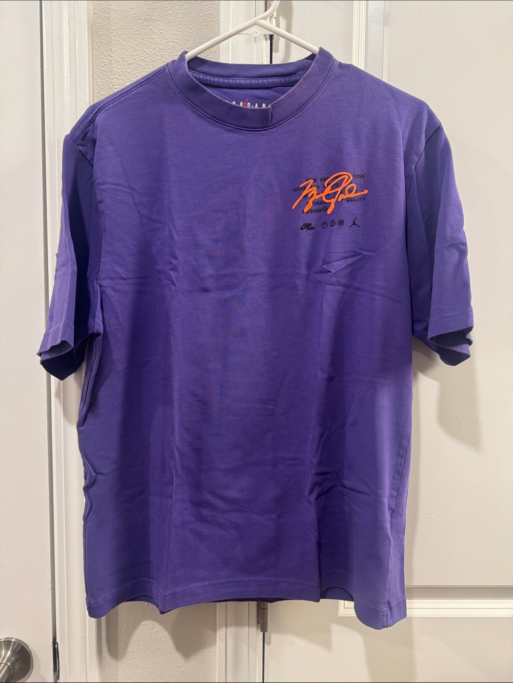 Jordan Purple Short Sleeve Tee with Orange Script Accent